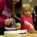 Kaitlyn Rodriguez, four, points at the slice of cheese pizza she would like at Huron High School on Friday. Daniel Brenner I AnnArbor.com